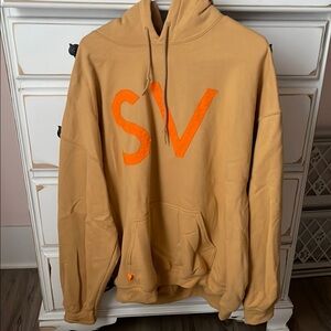 Tan and Orange Pullover Hoodie with Bold Graphic
